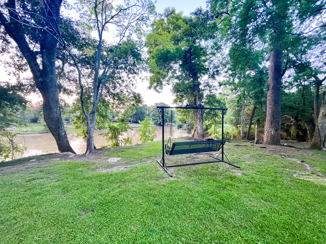 A wrought iron swing that provides amazing views of the Vermilion Bayou
