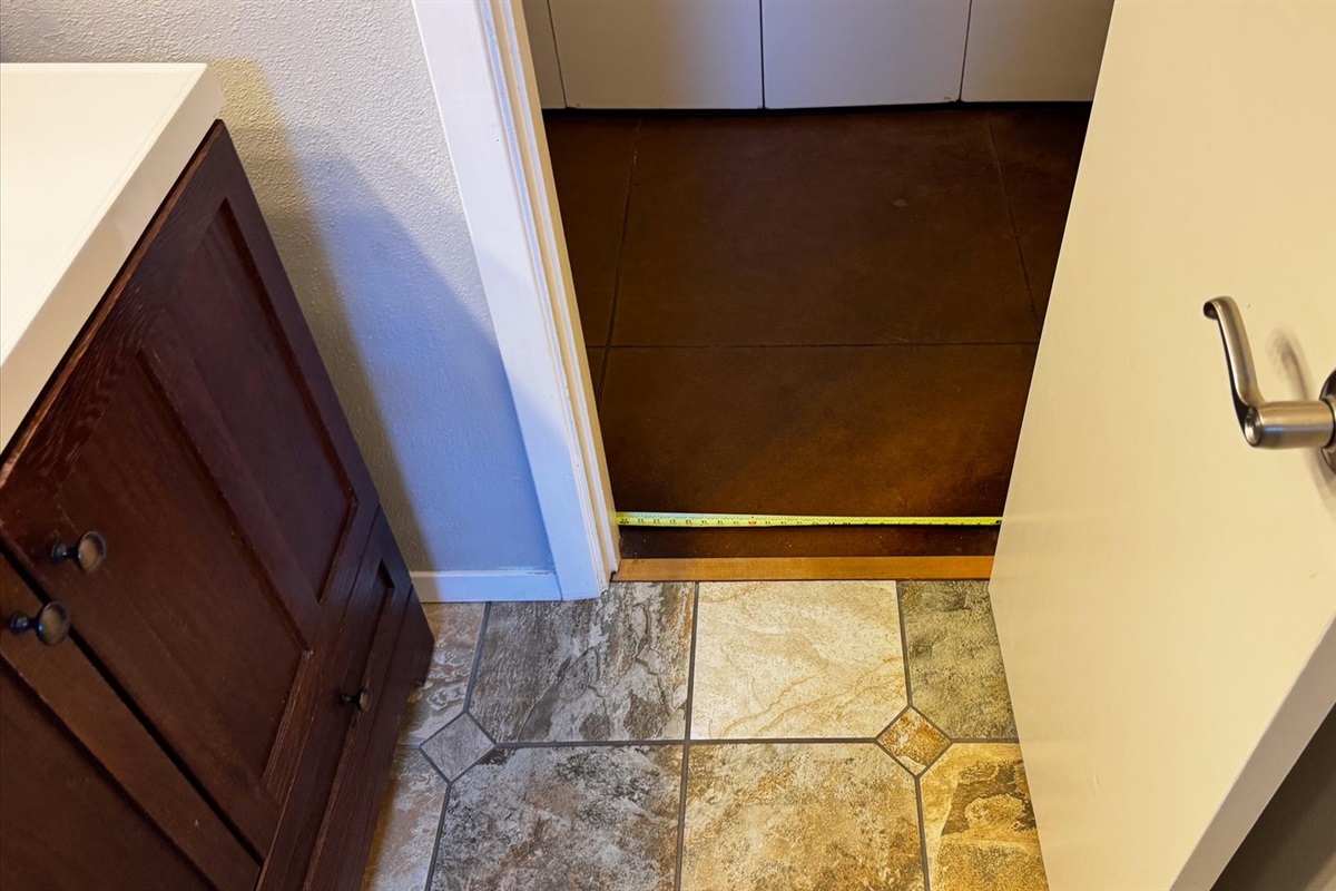 View into Hall Bathroom. Zero step entry. 