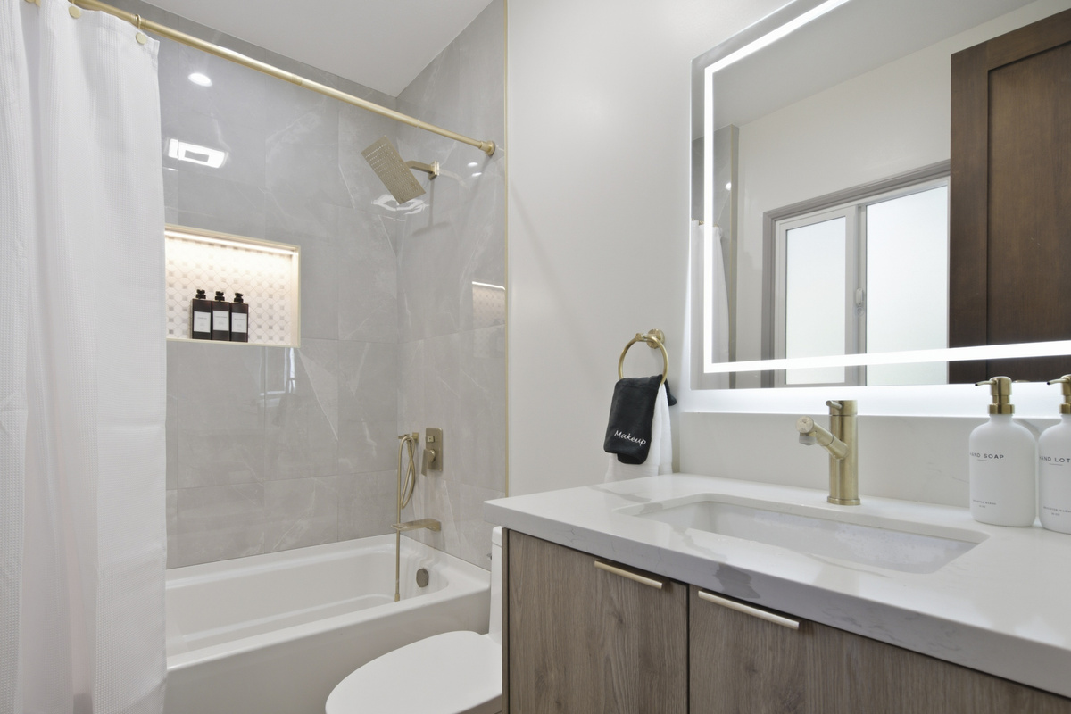 Stylish details and thoughtful design make this bathroom a standout feature.