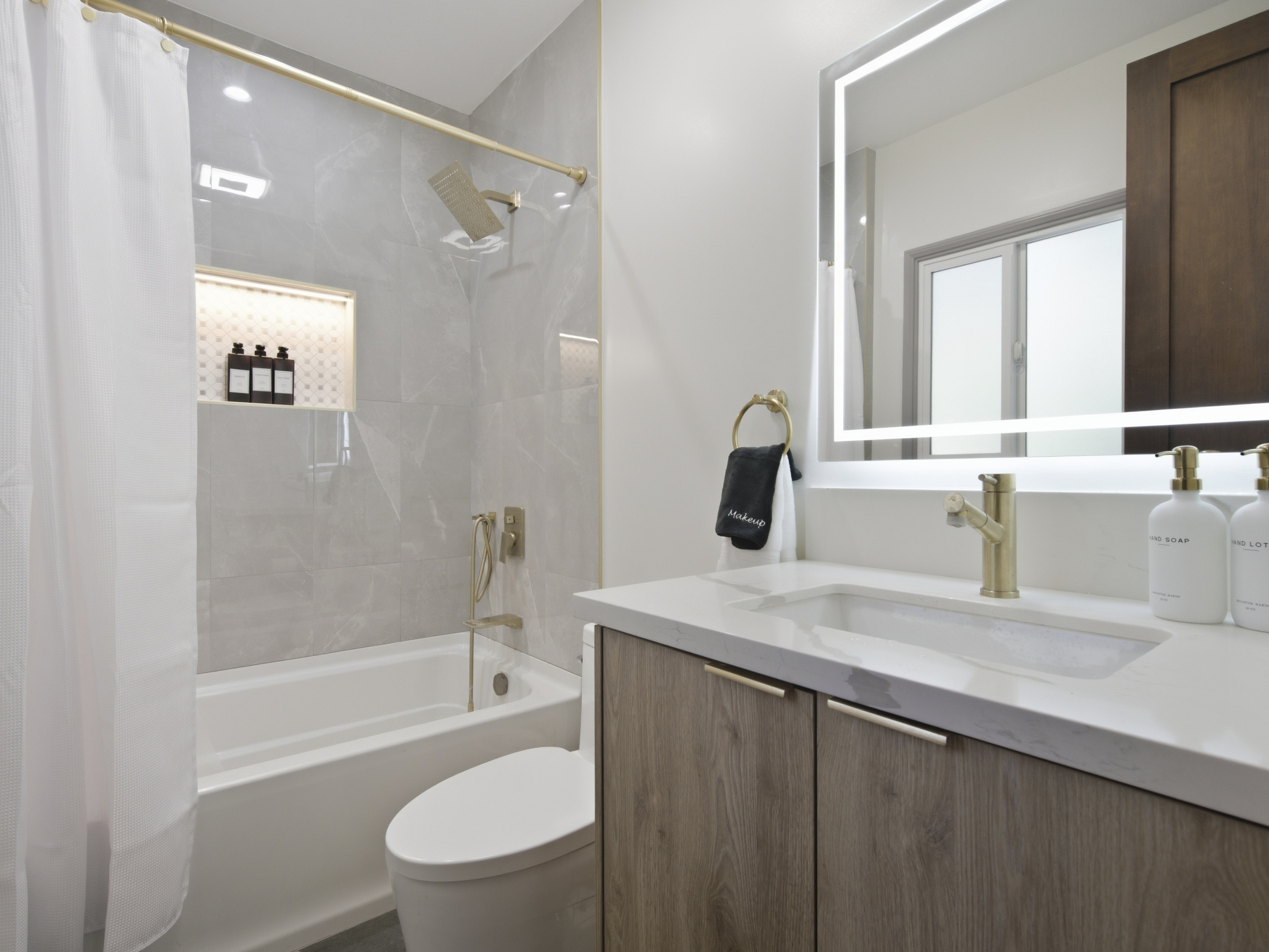 Stylish details and thoughtful design make this bathroom a standout feature.