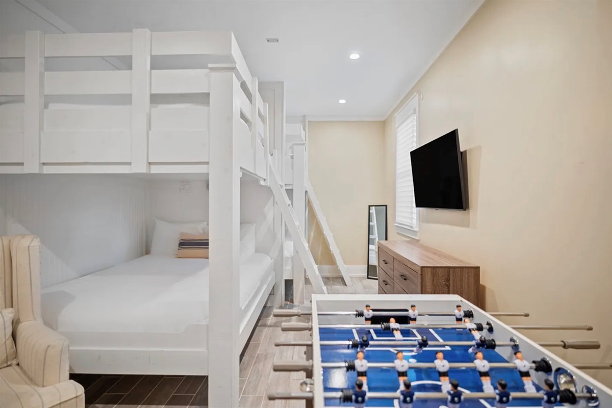 1st Floor BUNK ROOM with Queen/Queen Bunk Bed, Full/Full Bunk Beds, Foosball Table, Smart TV, Game Console with pre-loaded games – perfect for the kids!