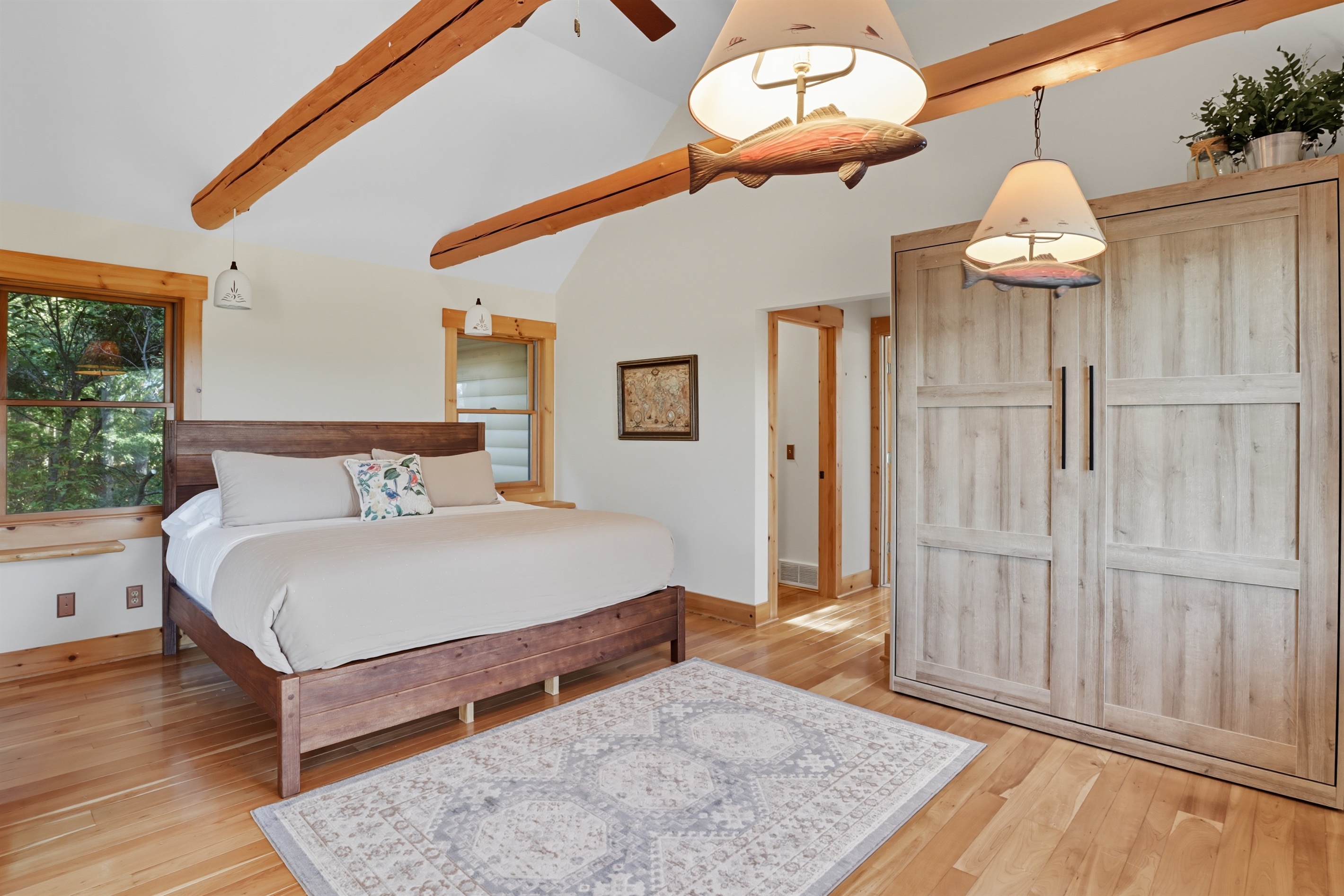 Bedroon 1, Spacious king master bedroom with queen Murphy bed and private outdoor access.
