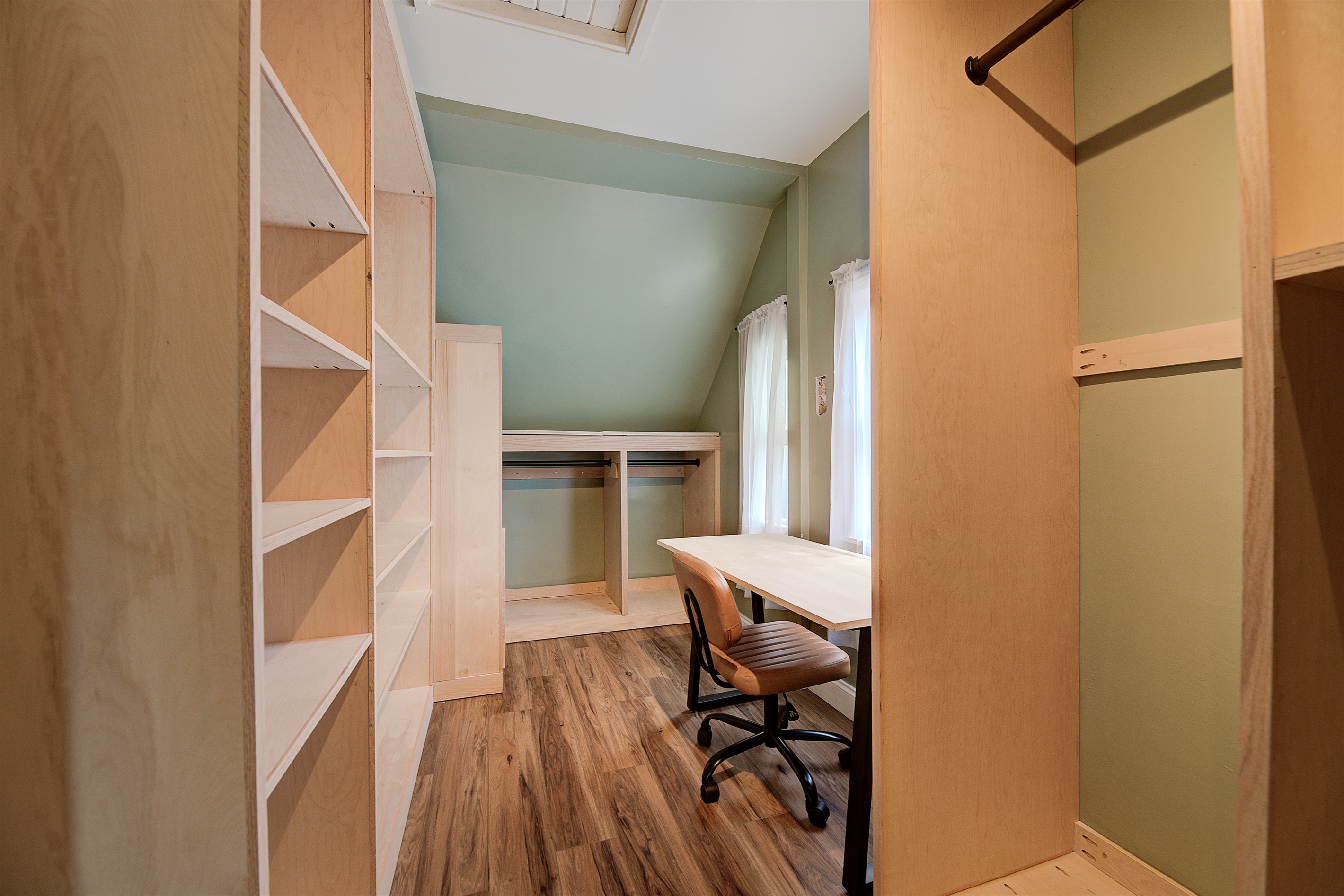 walk in closet with dedicated work area