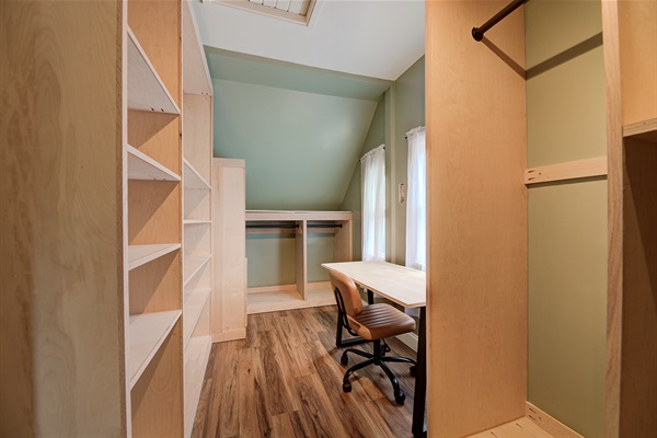 walk in closet with dedicated work area