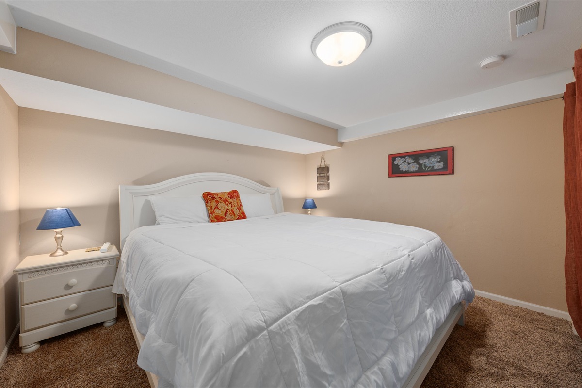This room offers a large king bed and is closest to the main bathroom for your convenience.