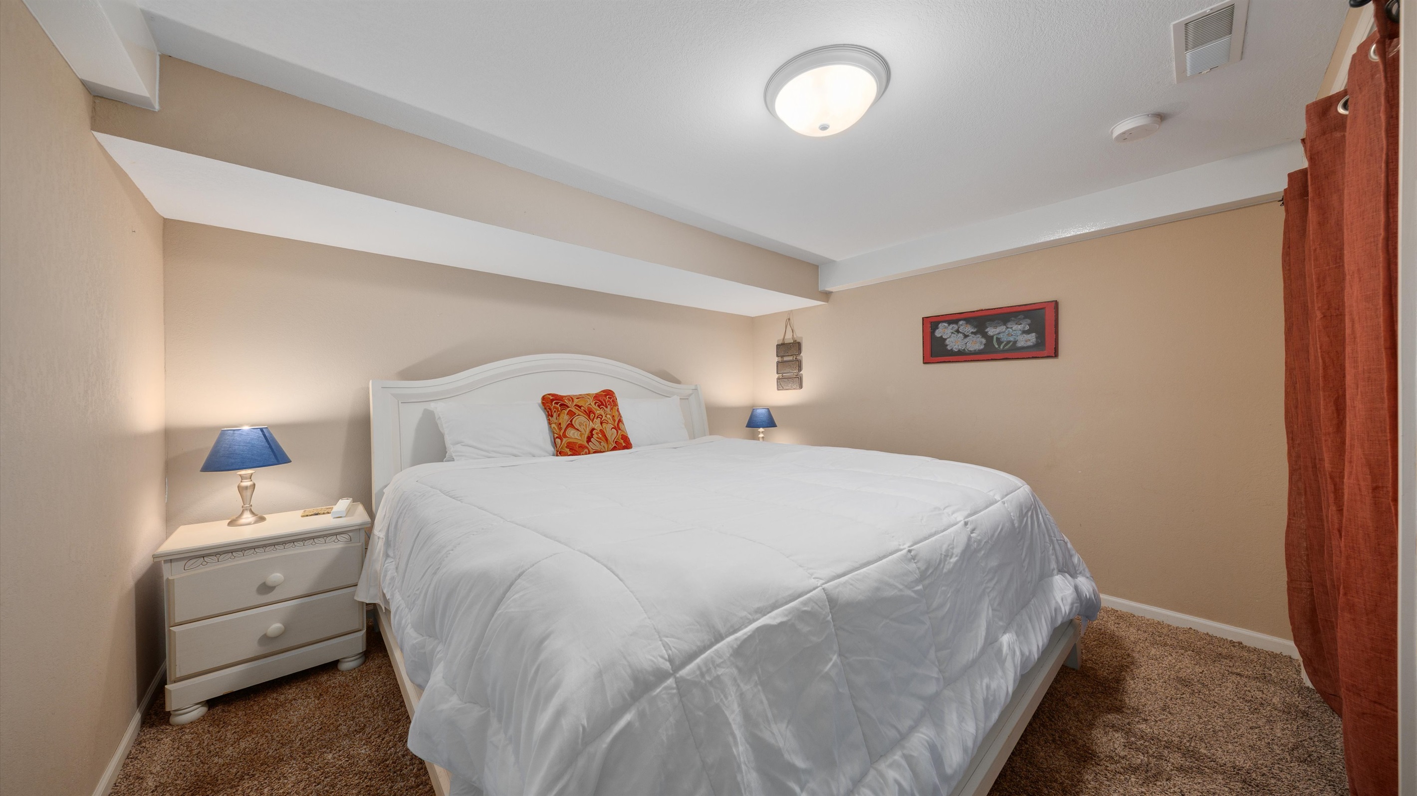 This room offers a large king bed and is closest to the main bathroom for your convenience.