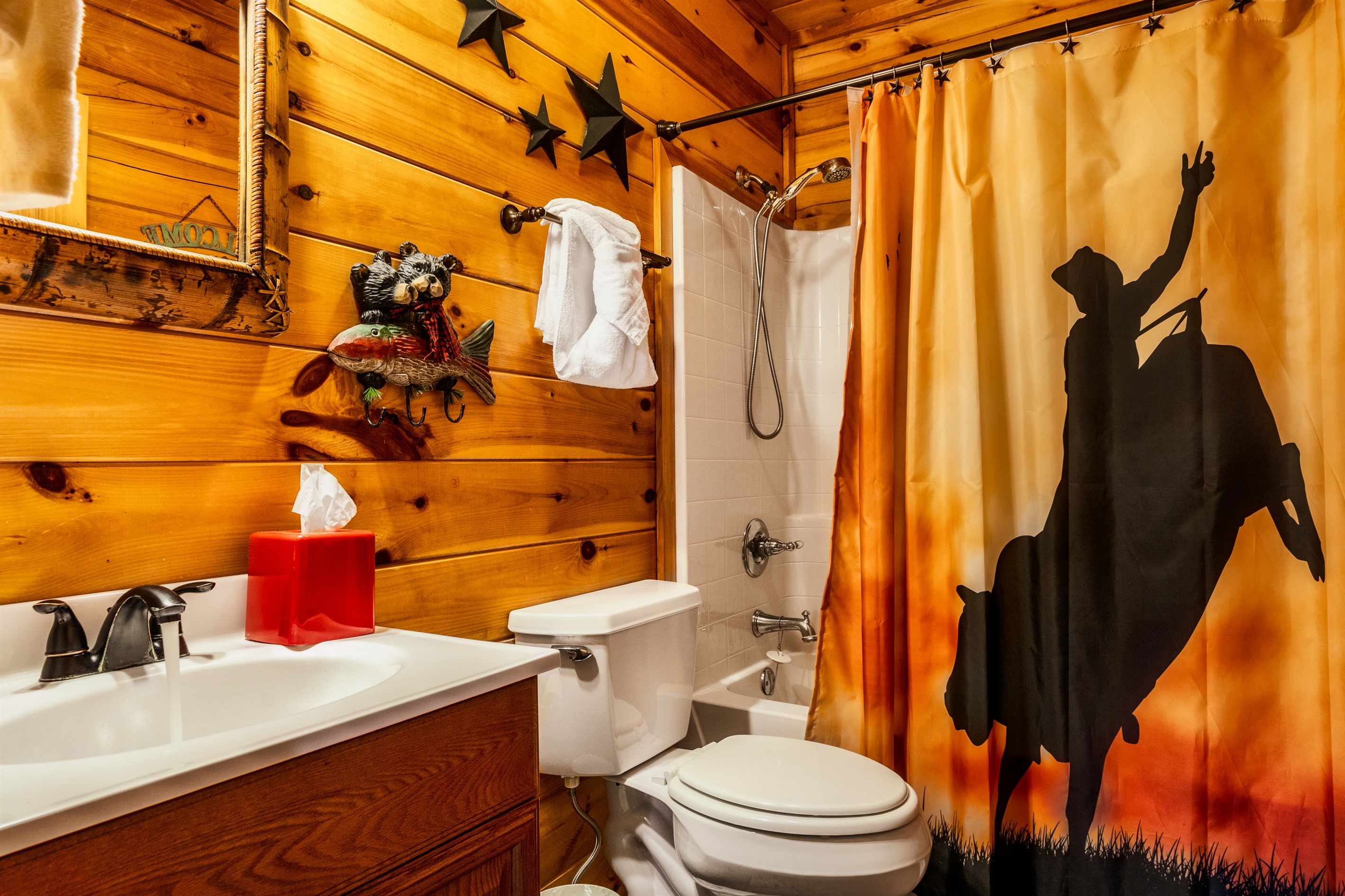 Main level full bath off the kitchen, can be used for guests sleeping on the trundle bed in the great room.