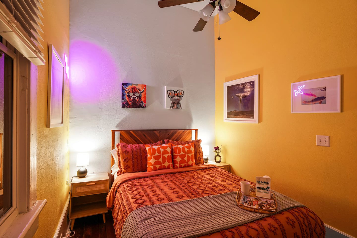 Enjoy the stylish decor and extra pillows in the Yellow Room 