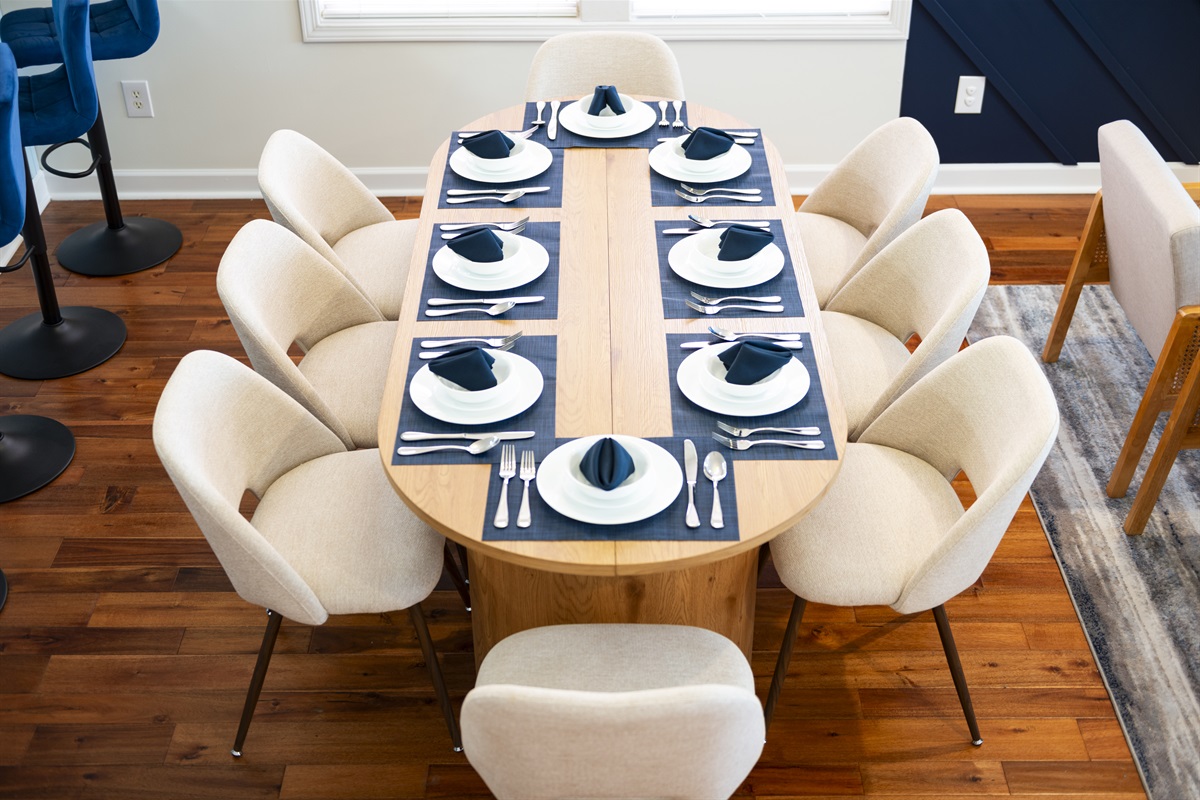[Open Concept Dining Area] Gather around our spacious 8-seater dining table in our open-concept dining area. Share laughter, stories, and delicious meals in a setting designed for unforgettable moments together, while creating lasting memories!