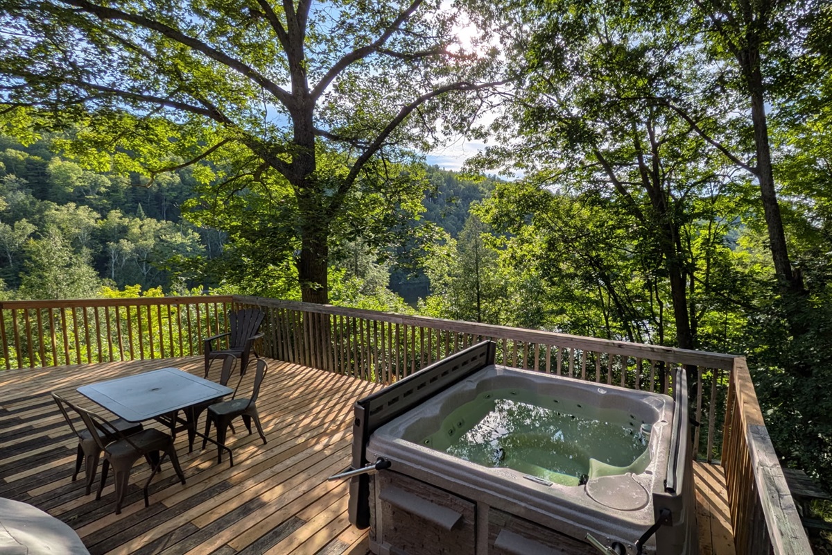 Cottage balcony with hot tub