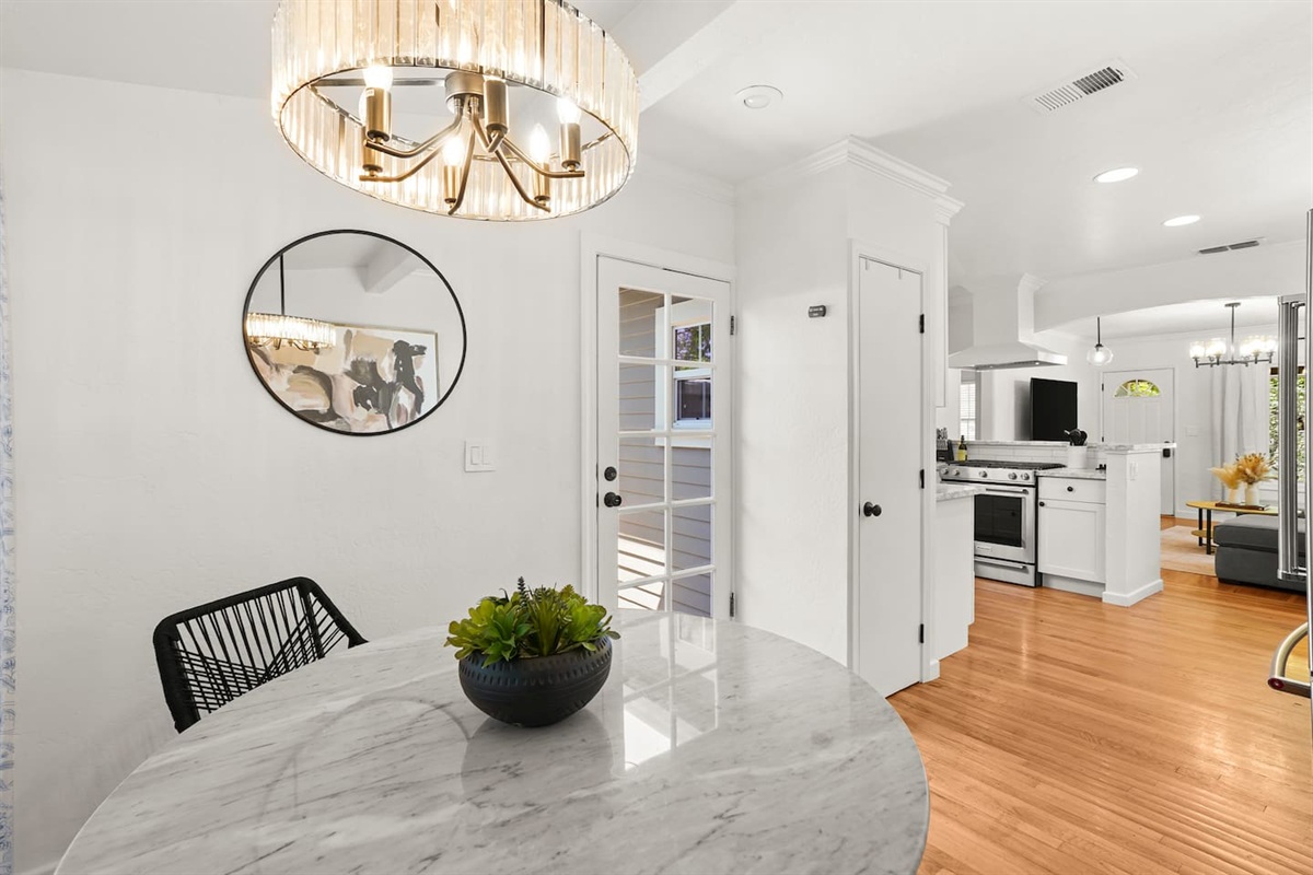 Dining area with stylish seating, natural light, and the perfect space to gather for meals, coffee, or wine nights.