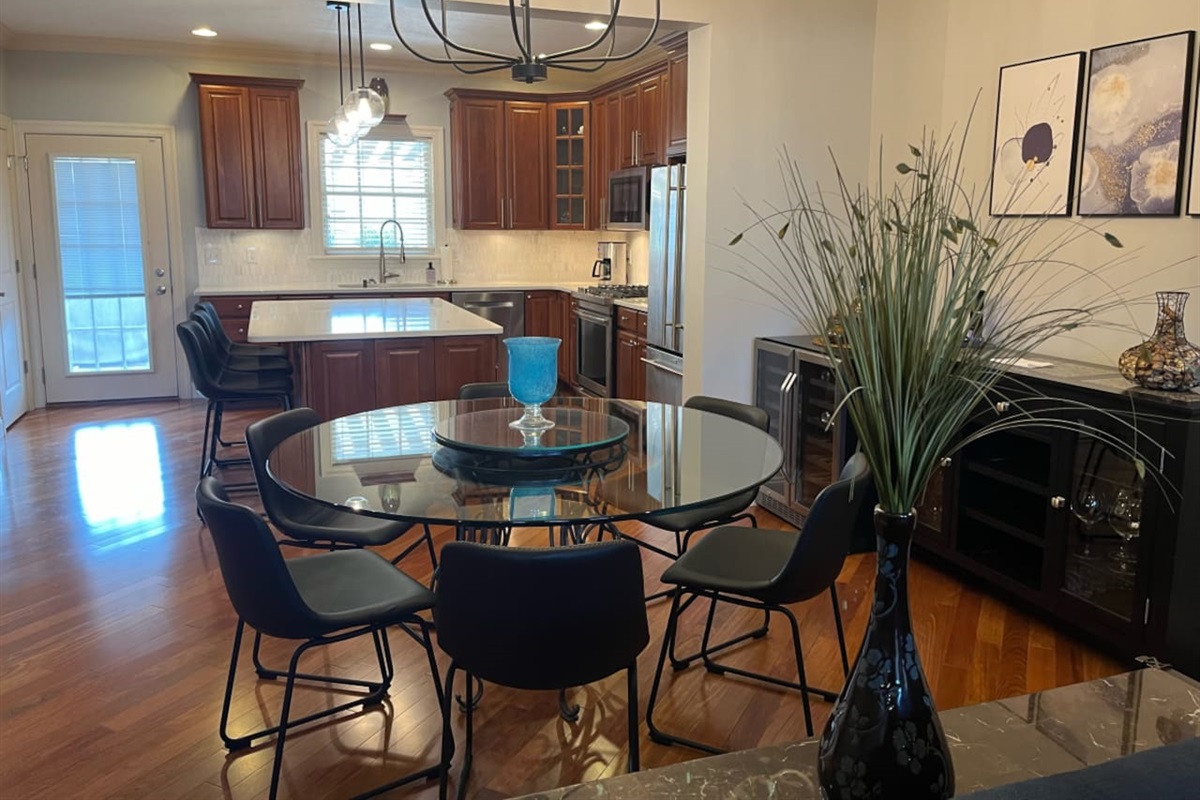 Spacious 6-seater dining table, perfect for enjoying meals with family or friends in a comfortable and inviting setting.