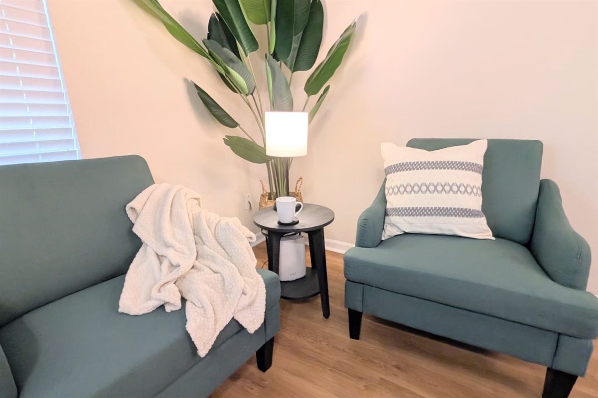 Settle in with a cup of coffee and a good book in this cozy corner. 