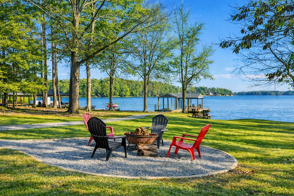Fire Pit Retreat: Gather around the fire pit with stunning lake views for unforgettable evenings!
