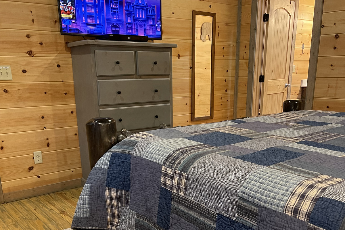 Downstairs Master bedroom #1 with a King bed and Roku tv.