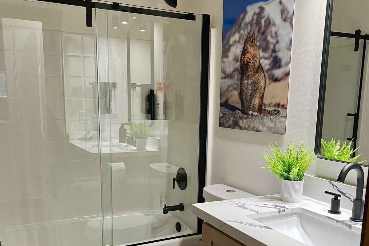 Upstairs bathroom with tub