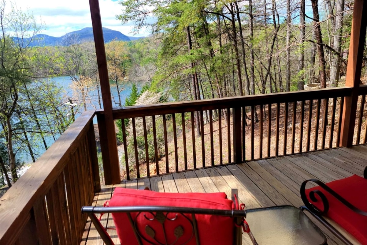 Enjoy sitting on the deck overlooking the lake and beach with huge Chimney Rock Mountain Views!