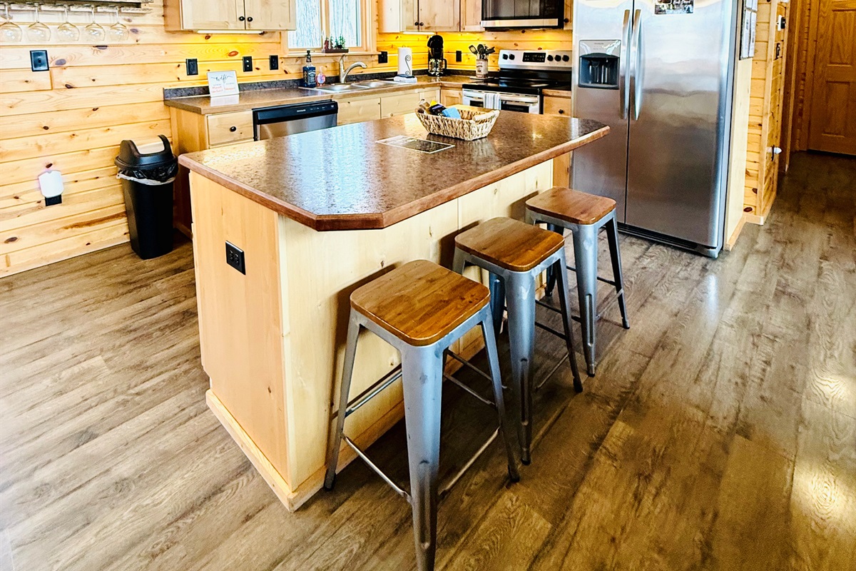 Our kitchen with large center island has everything you need.