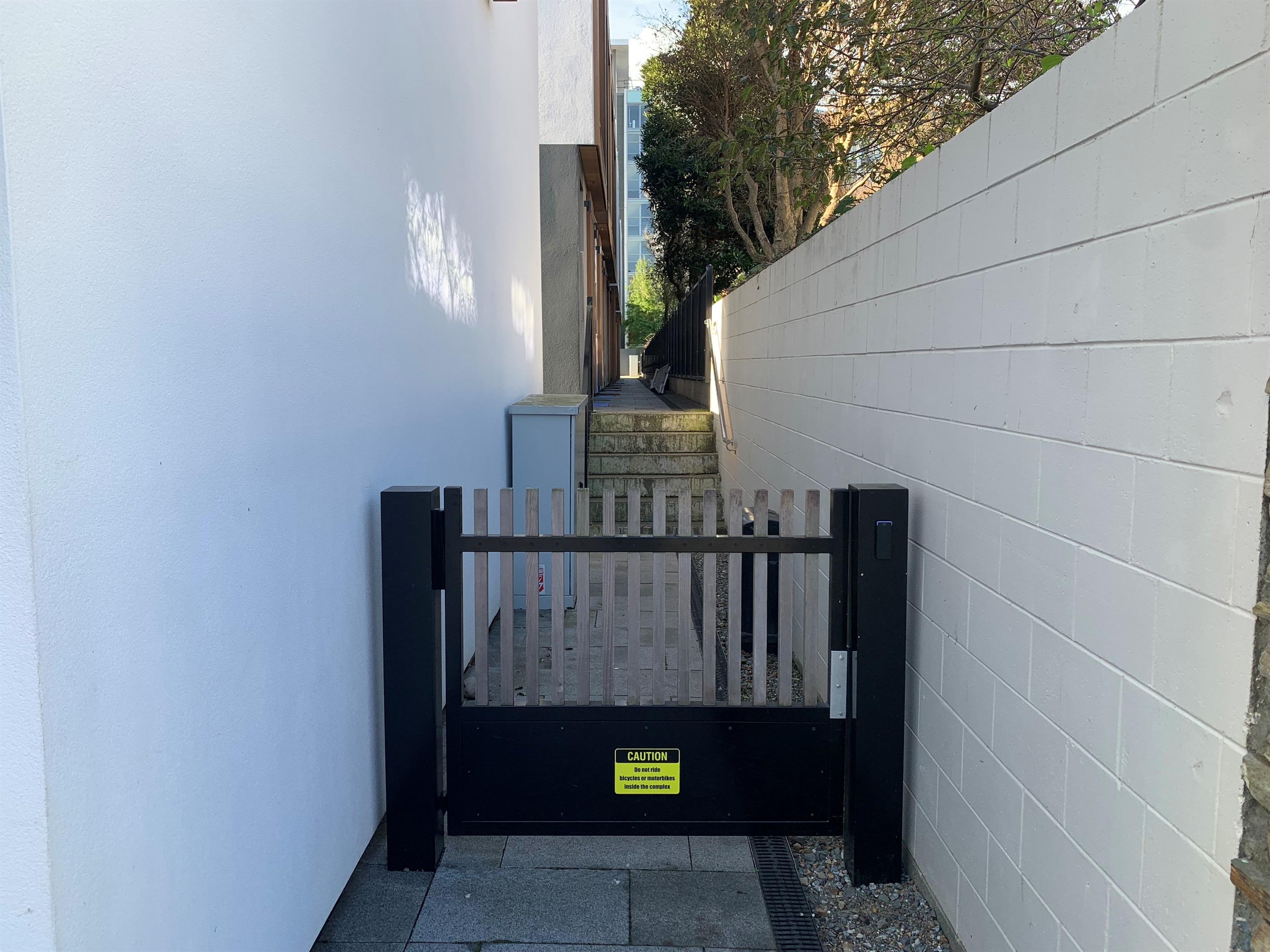 Gate leads you to your Apartment