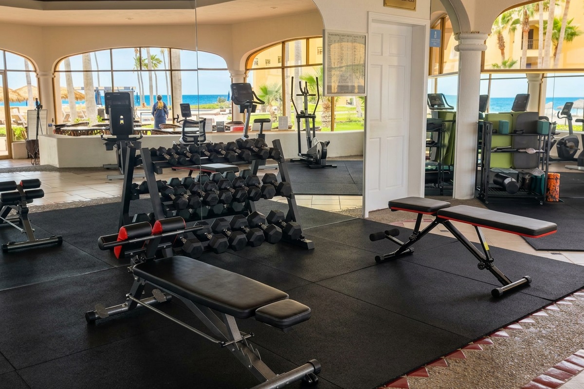 Gym equipment, free weights located in the clubhouse