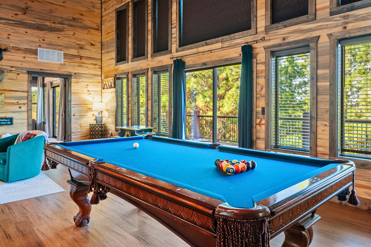 Enjoy the game room’s comfortable seating and bright open space—ideal for playing or just relaxing with a movie.