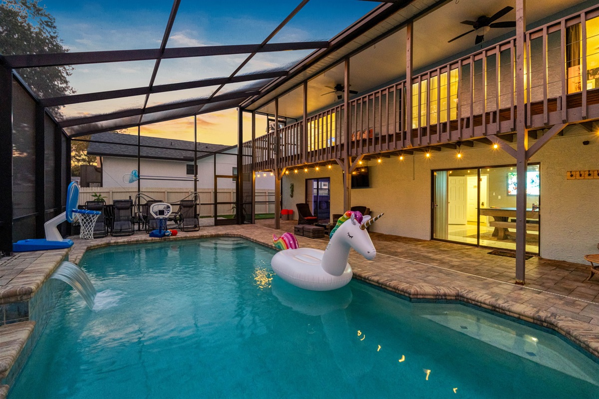 From the tropical vibe to the playful inflatables and water features, this backyard pool is as Insta-worthy as it is refreshing.