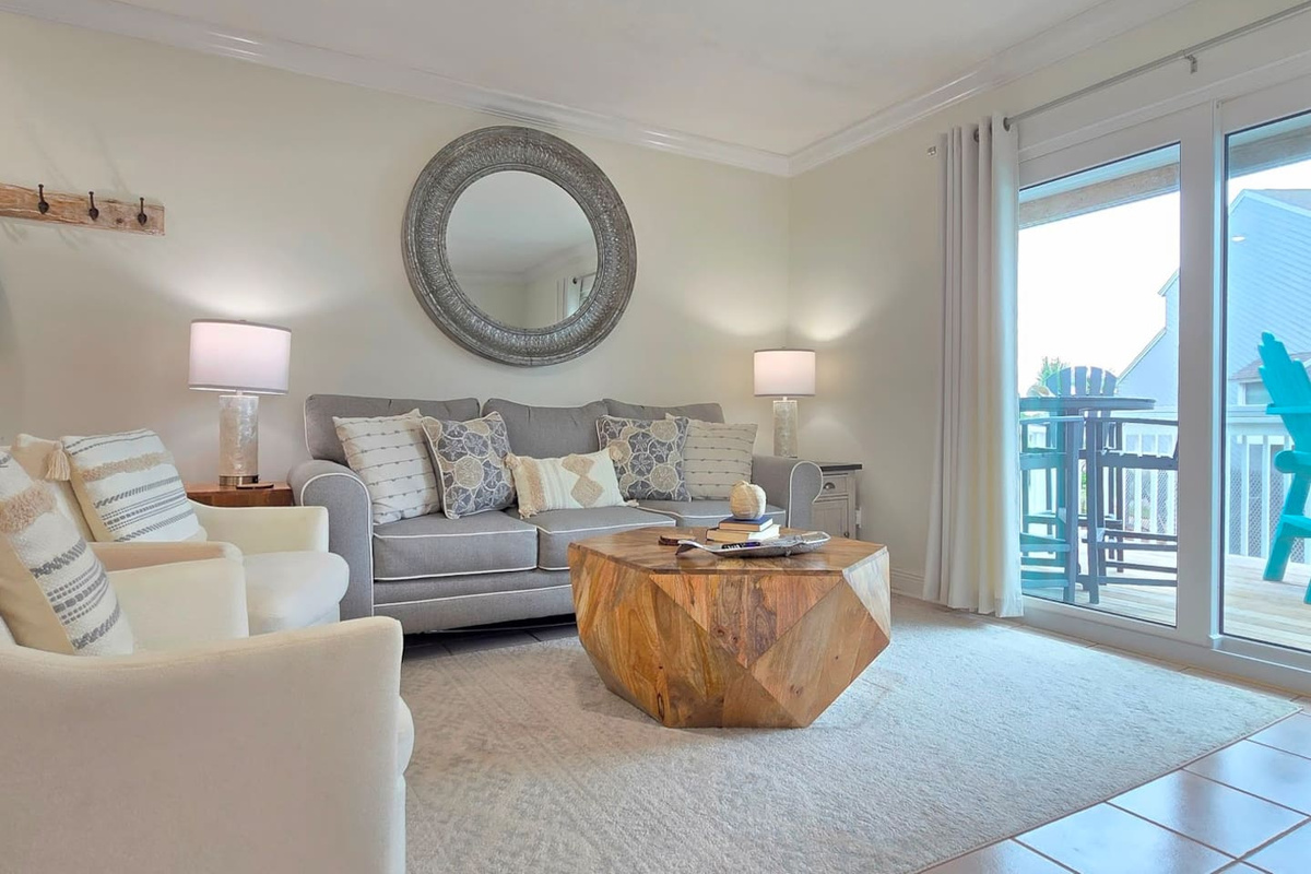 Gather the whole group in the main living room and let the evening find its rhythm &mdash; wide enough for six and comfortable enough to stay all night.