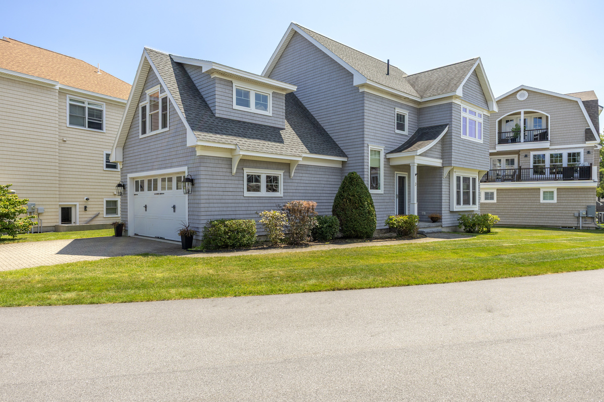 Beautiful curb appeal and a peaceful neighborhood setting welcome you to your home by the shore.
