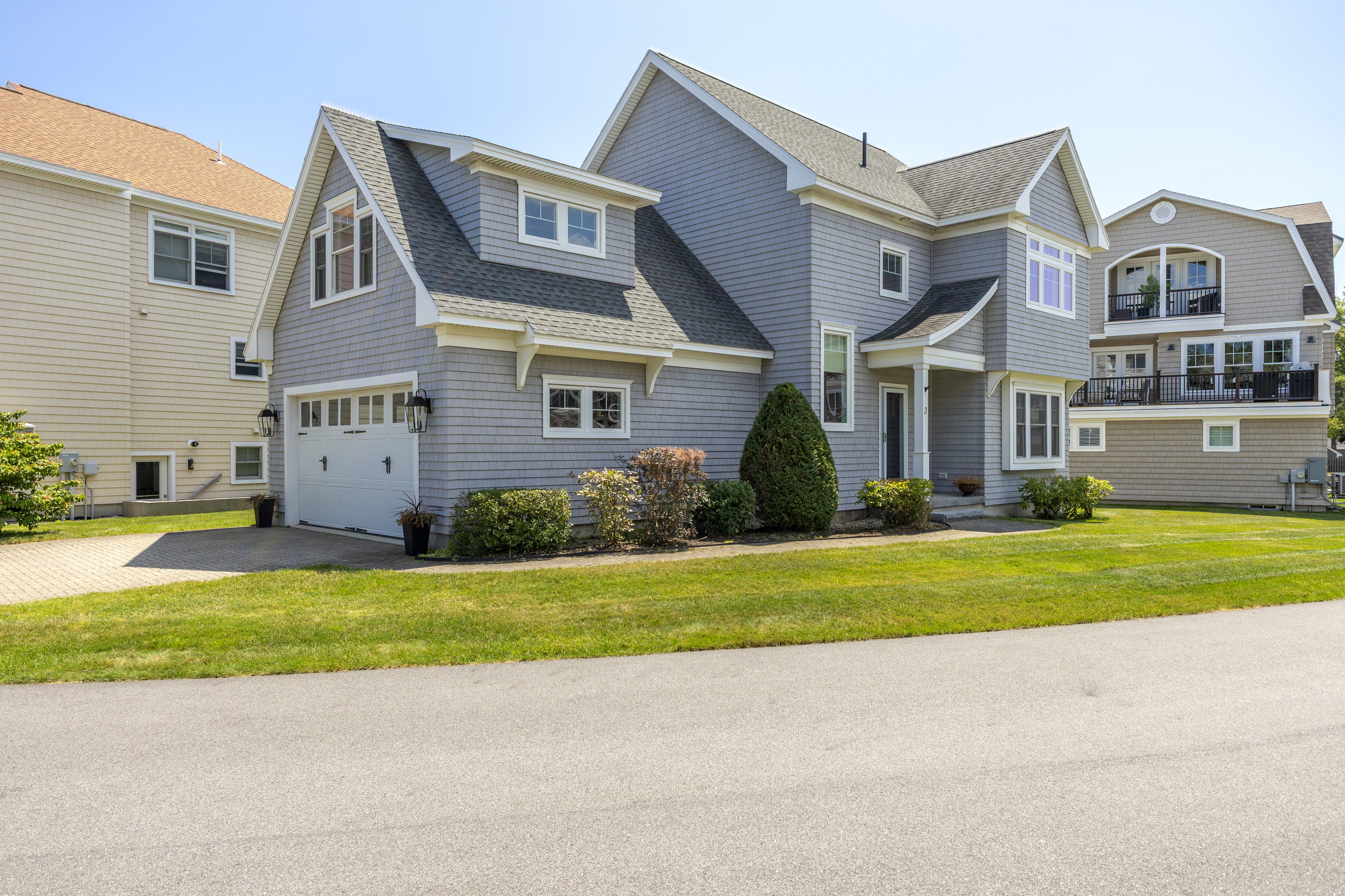 Beautiful curb appeal and a peaceful neighborhood setting welcome you to your home by the shore.