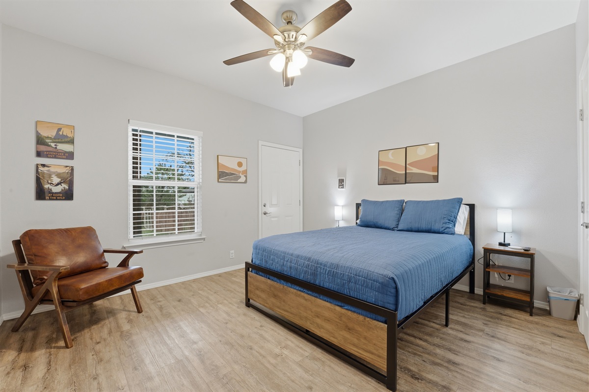 Comfortable queen bedroom with premium mattress and smart TV