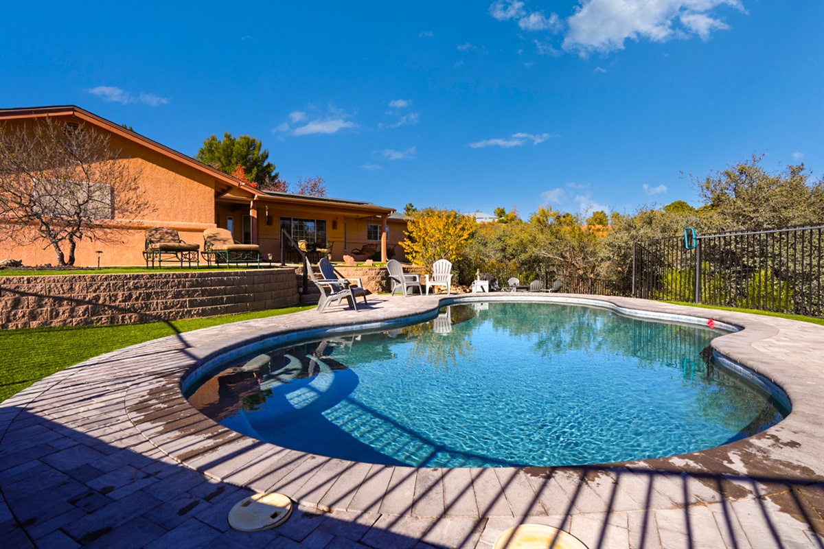 Private in-ground pool with lounge chairs—cool off, soak up the sun, and enjoy your own desert oasis.