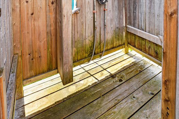 Convenient outdoor shower with hot and cold water for an easy post-beach rinse.