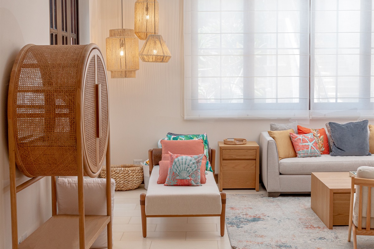 Located in the right wing beside the kitchen, the large living room directly off the pool area is perfect for relaxing after a day at the beach.