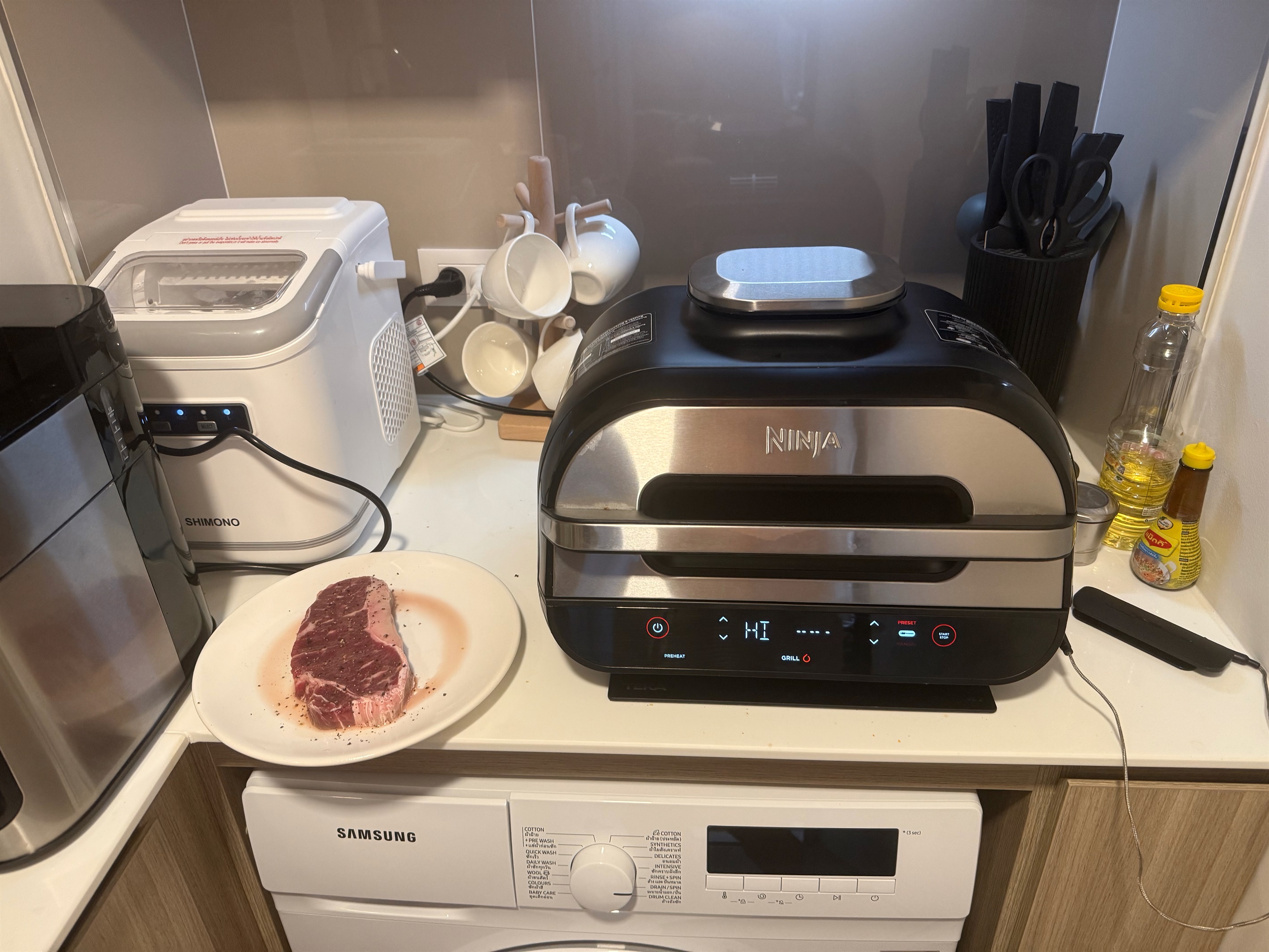 Ice Maker and the Ninja® Foodi® Smart XL Grill that sears, sizzles, and air fry crisps. Has probe for cooking meat to a desired doneness, from rare to well-done.