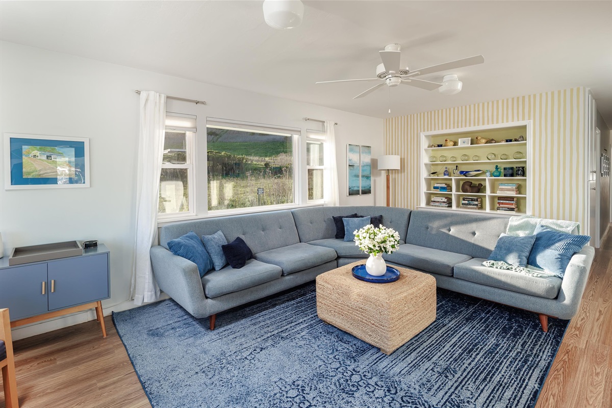 A bright, welcoming living room perfect for family time, movie nights, and unwinding after a day of adventure.