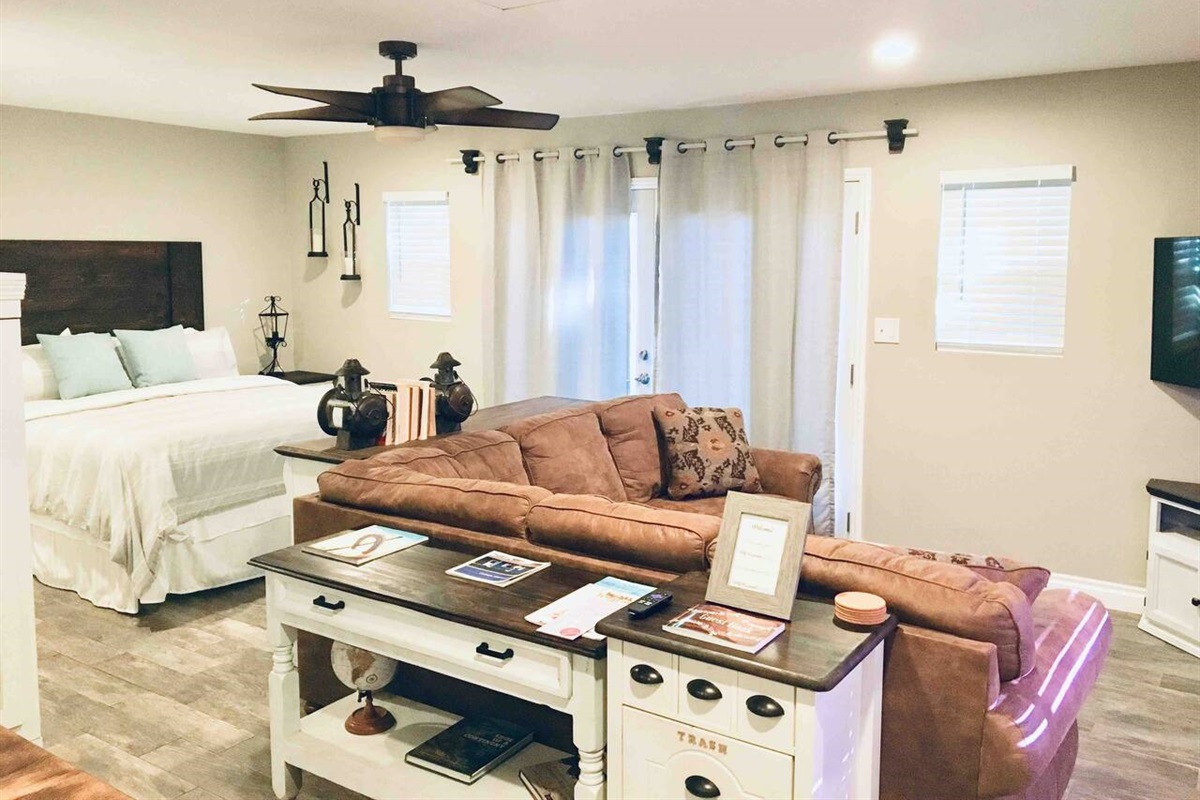 Cozy Blue Cottage interior with king bed and minisplit AC