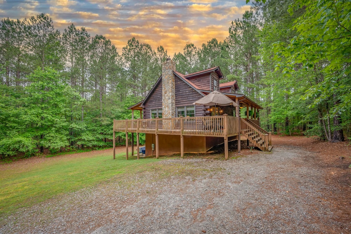 Large 3 story log cabin in private setting on acres of woods, minutes from town