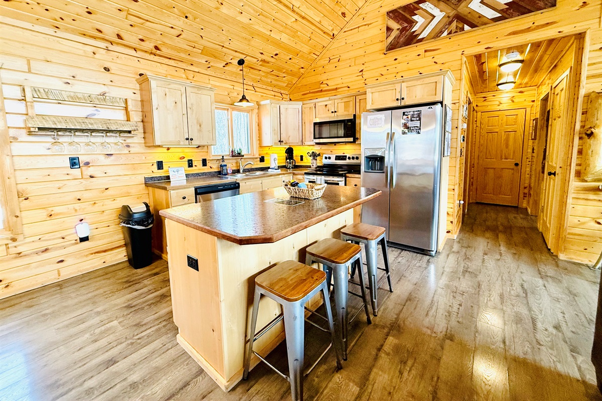 Our kitchen with large center island has everything you need.