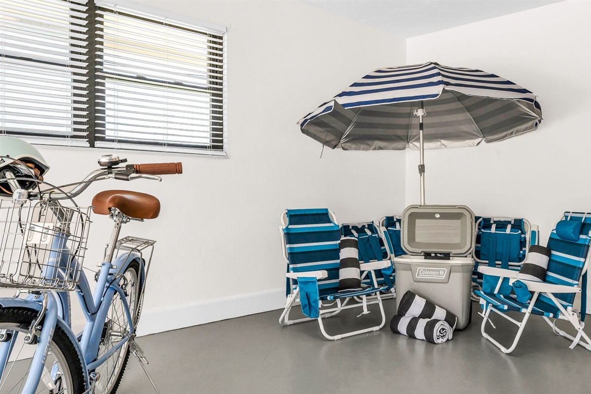 Enjoy a garage filled with extras — from a full-sized Ping Pong table, bikes, and fitness gear to beach chairs, umbrellas, towels, and a cooler — everything you need for fun at home or a perfect day by the water.