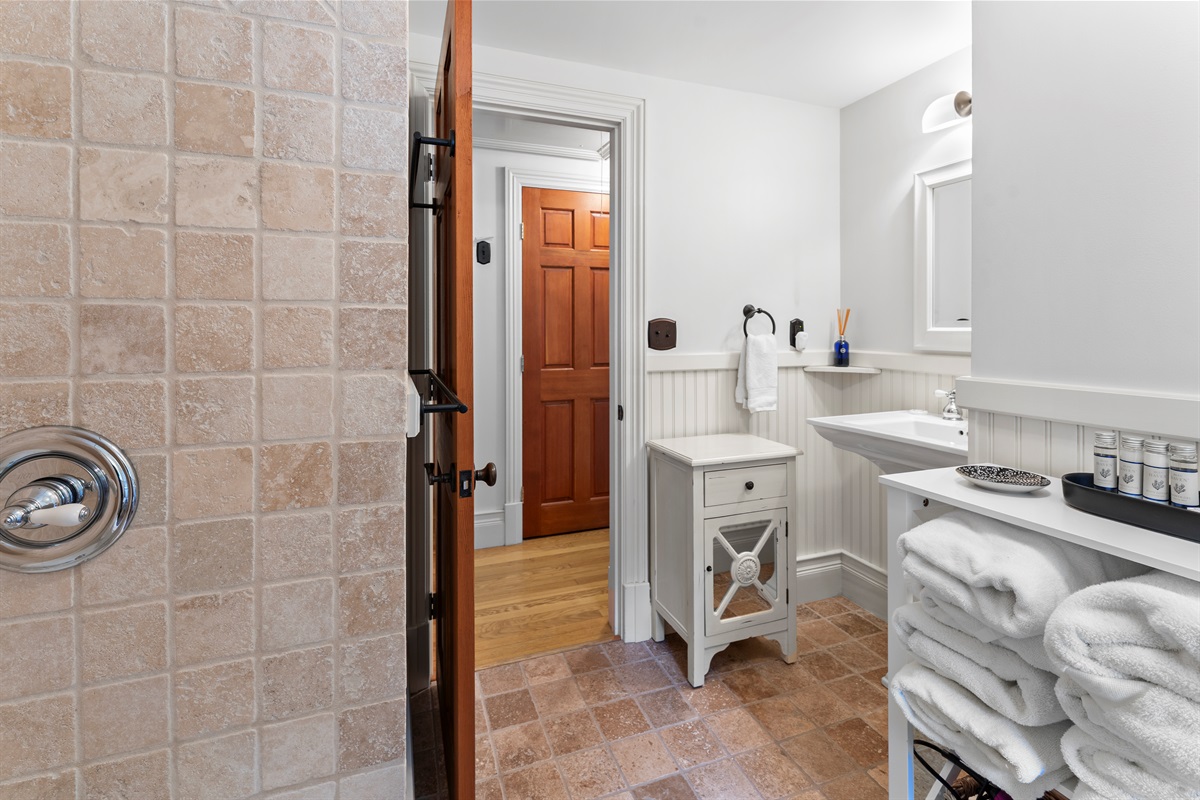 Your sanctuary, complete with soft towels and a spotless bathroom.