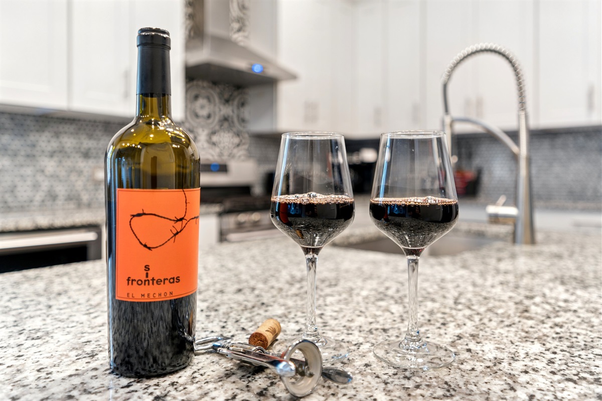 Pour a glass of wine and unwind while the chef in your group works their magic.