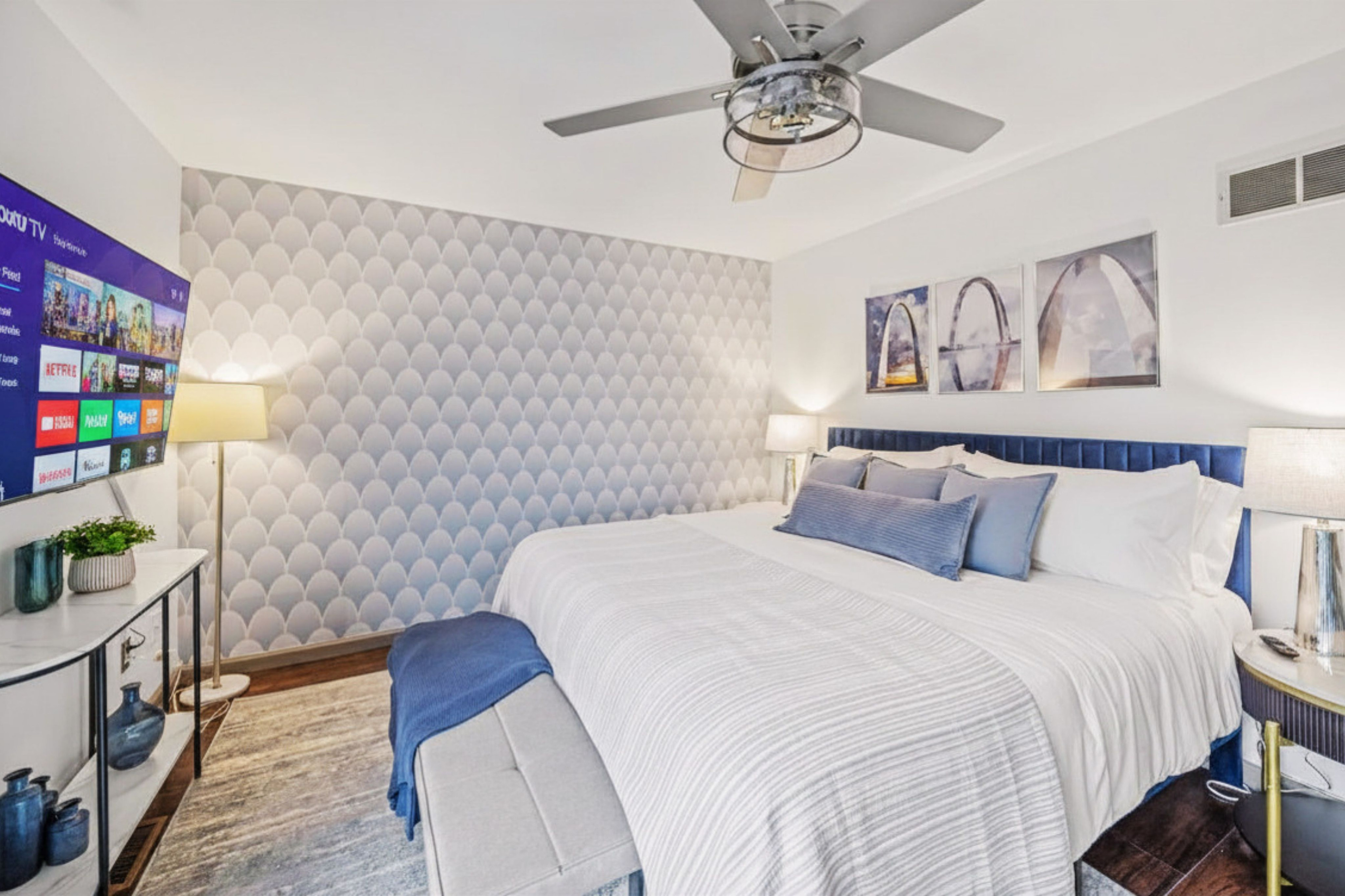 Primary king suite "The Landmark Suite" is inspired by the Gateway Arch with luxury finishes and private ensuite bath.