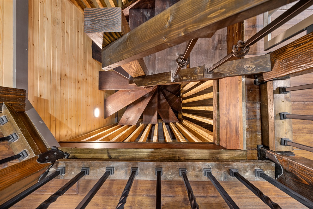 Newly designed spiral staircase seamlessly integrates nature into the house.