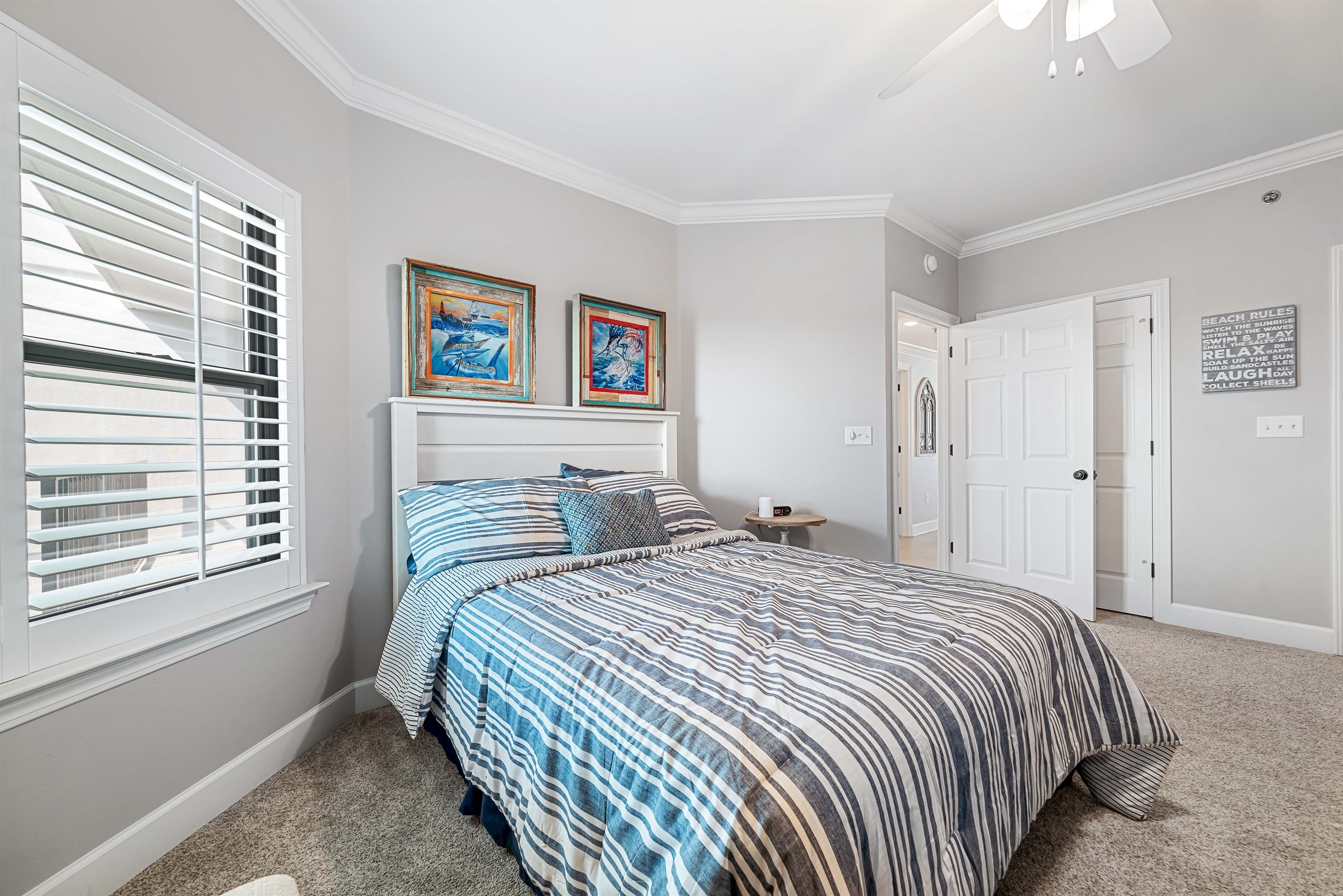 Unwind and recharge in this peaceful bedroom, designed with comfort and a serene ambiance in mind.