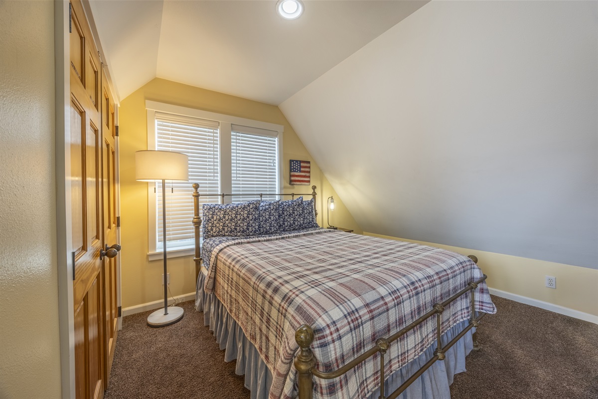 Soft, inviting quilts make the queen bedroom the perfect place to recharge after a day at the beach.