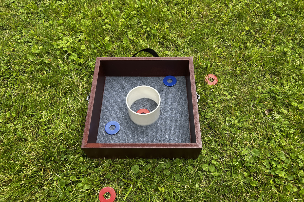 Get 2-4 people together to play a game of washer toss.