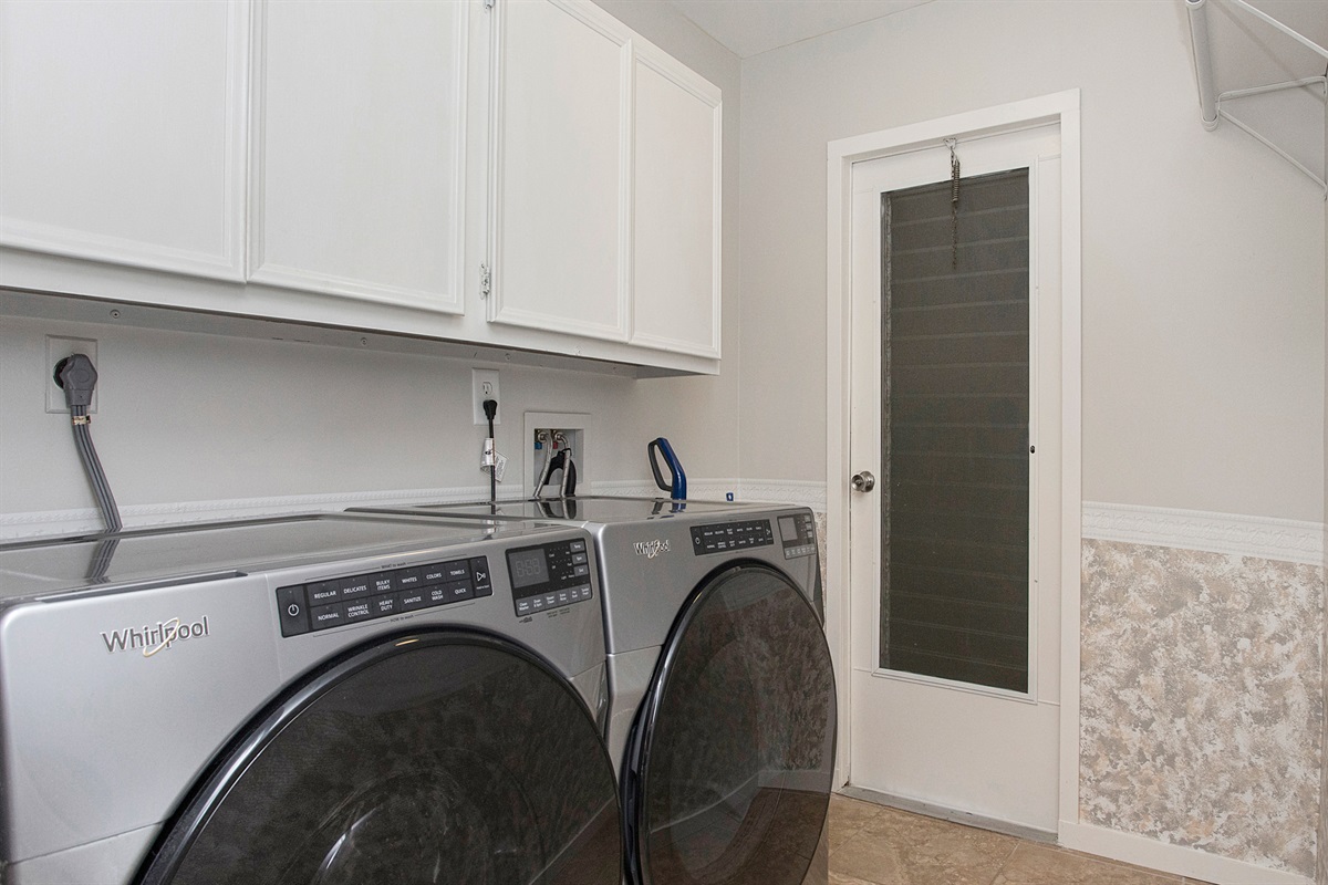 Complimentary laundry with oversized washer and dryer.
