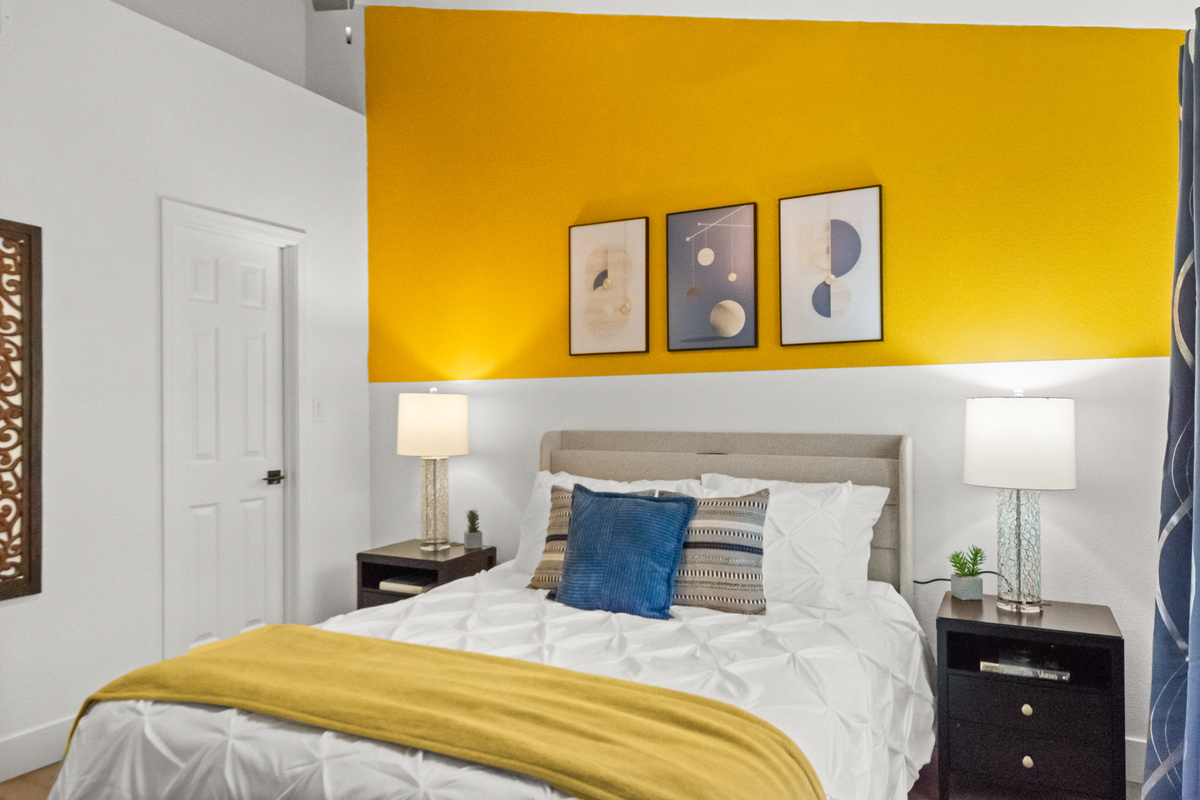 Modern comfort meets timeless style in this inviting bedroom space.