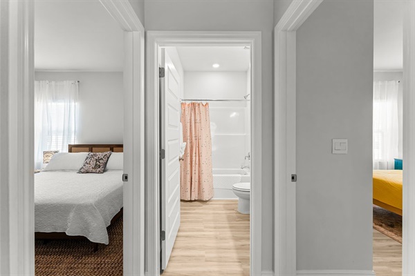 Hallway leading to two additonal bedrooms and bathrooms off the living area