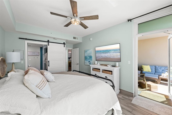 Sliding barn door leads to newly remodeled en suite
